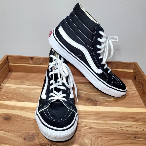 Vans Shoes - Vans Sk8-Hi sneakers in the classic Black/White color HIGH TOPS WMNS 8.5/MENS 7